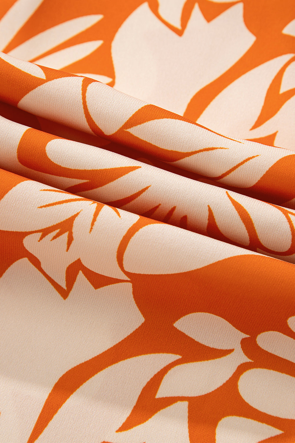 orange floral blouse