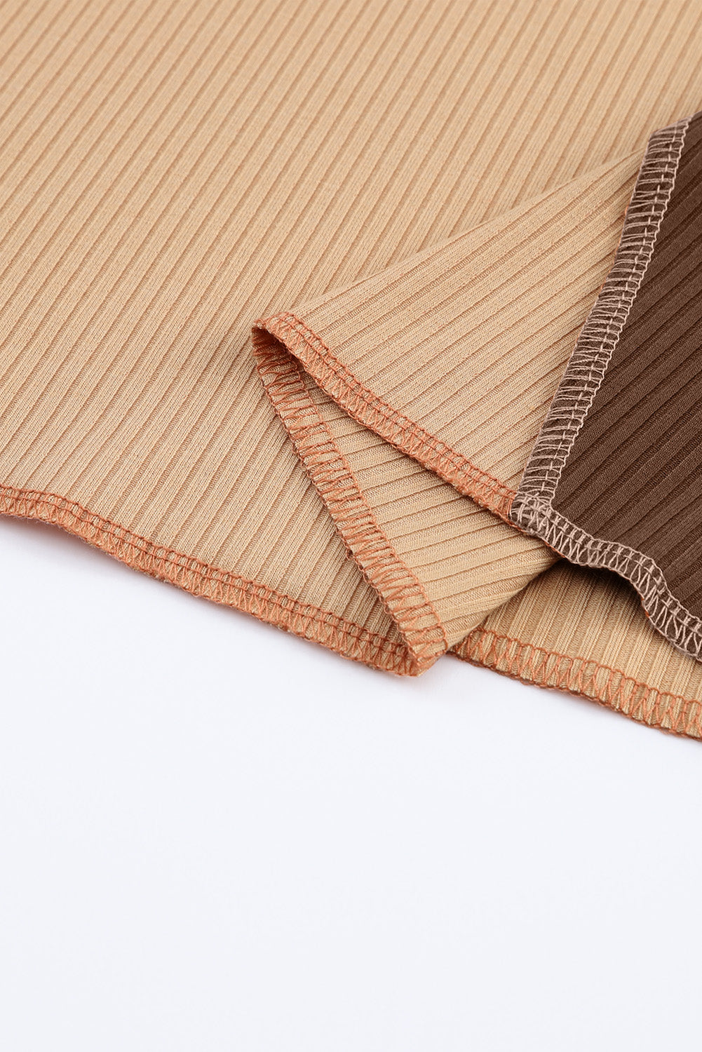 Knit Top with Exposed Seam Detail in Brown Color Block