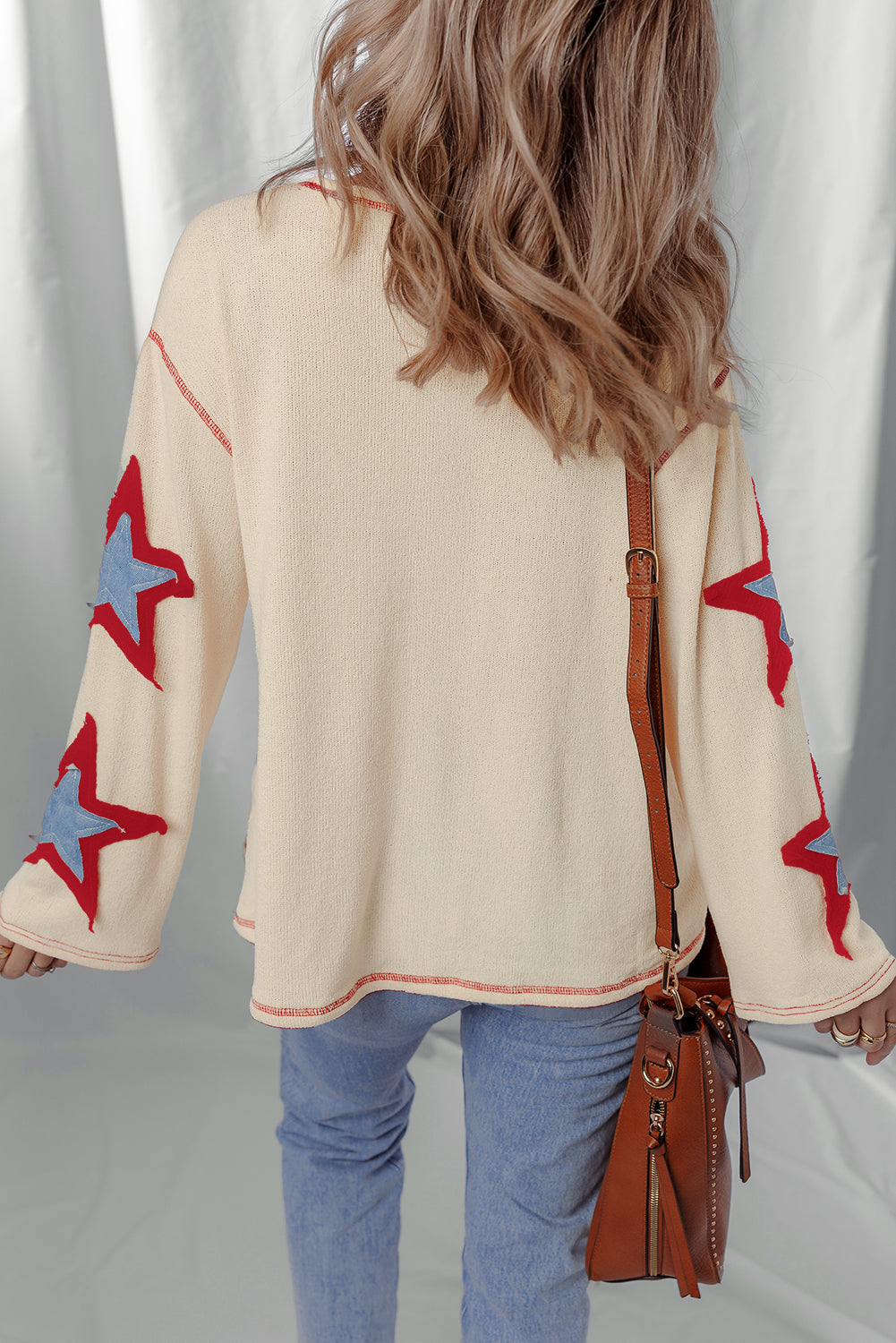 exposed seam long sleeve top