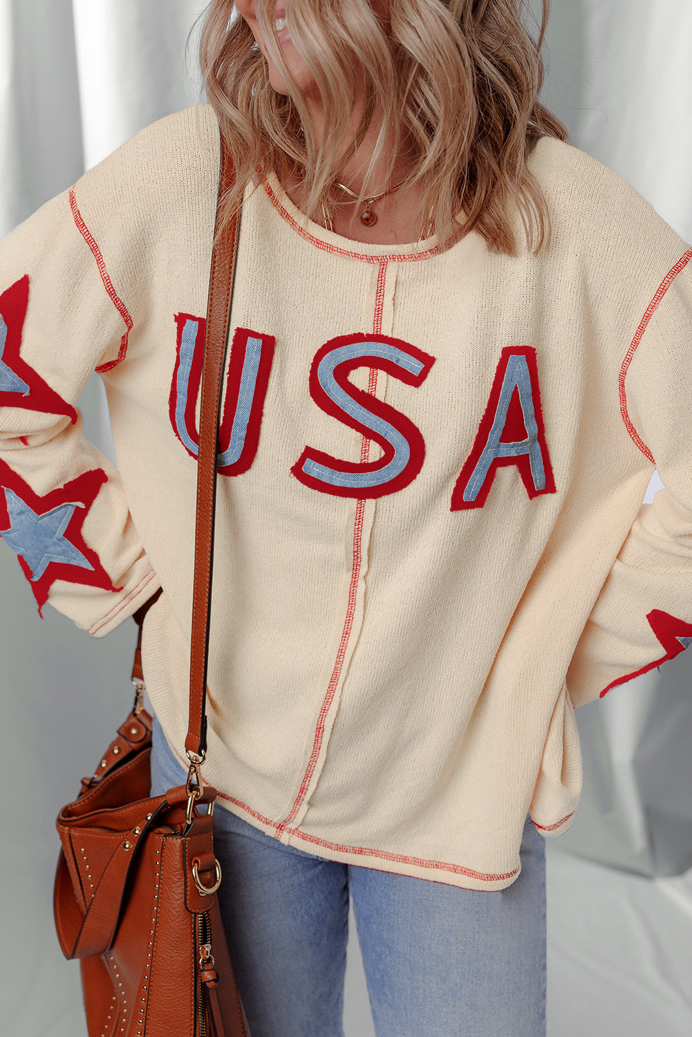exposed seam long sleeve top