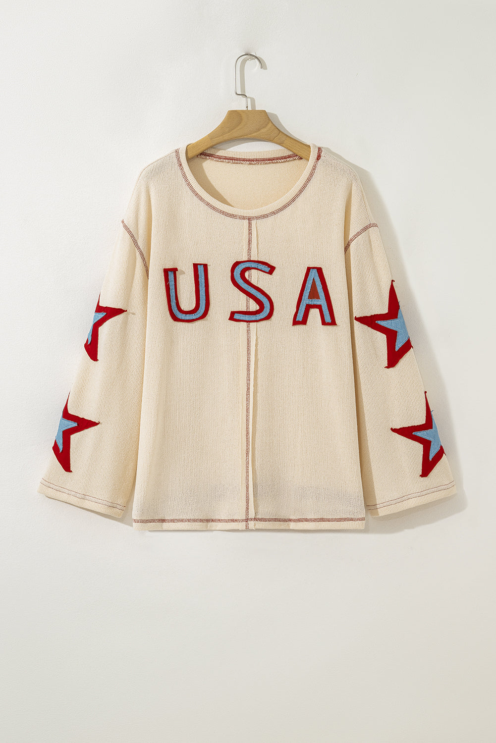 exposed seam long sleeve top