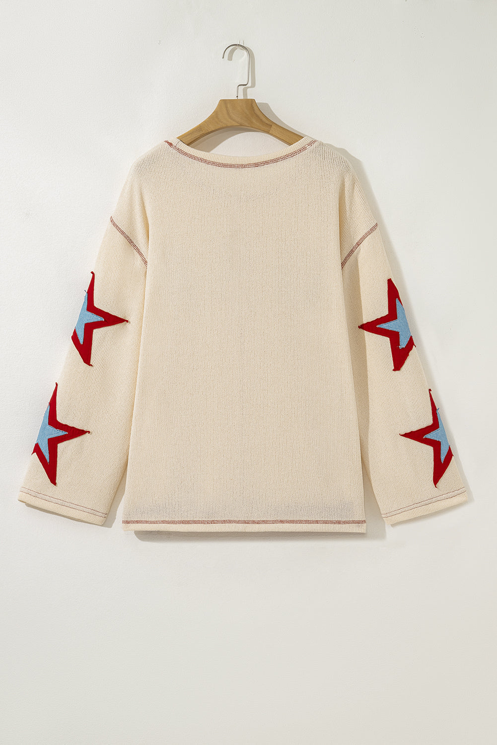 exposed seam long sleeve top