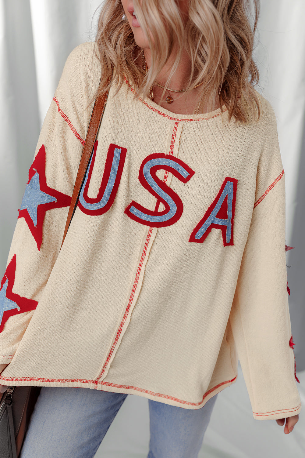 exposed seam long sleeve top