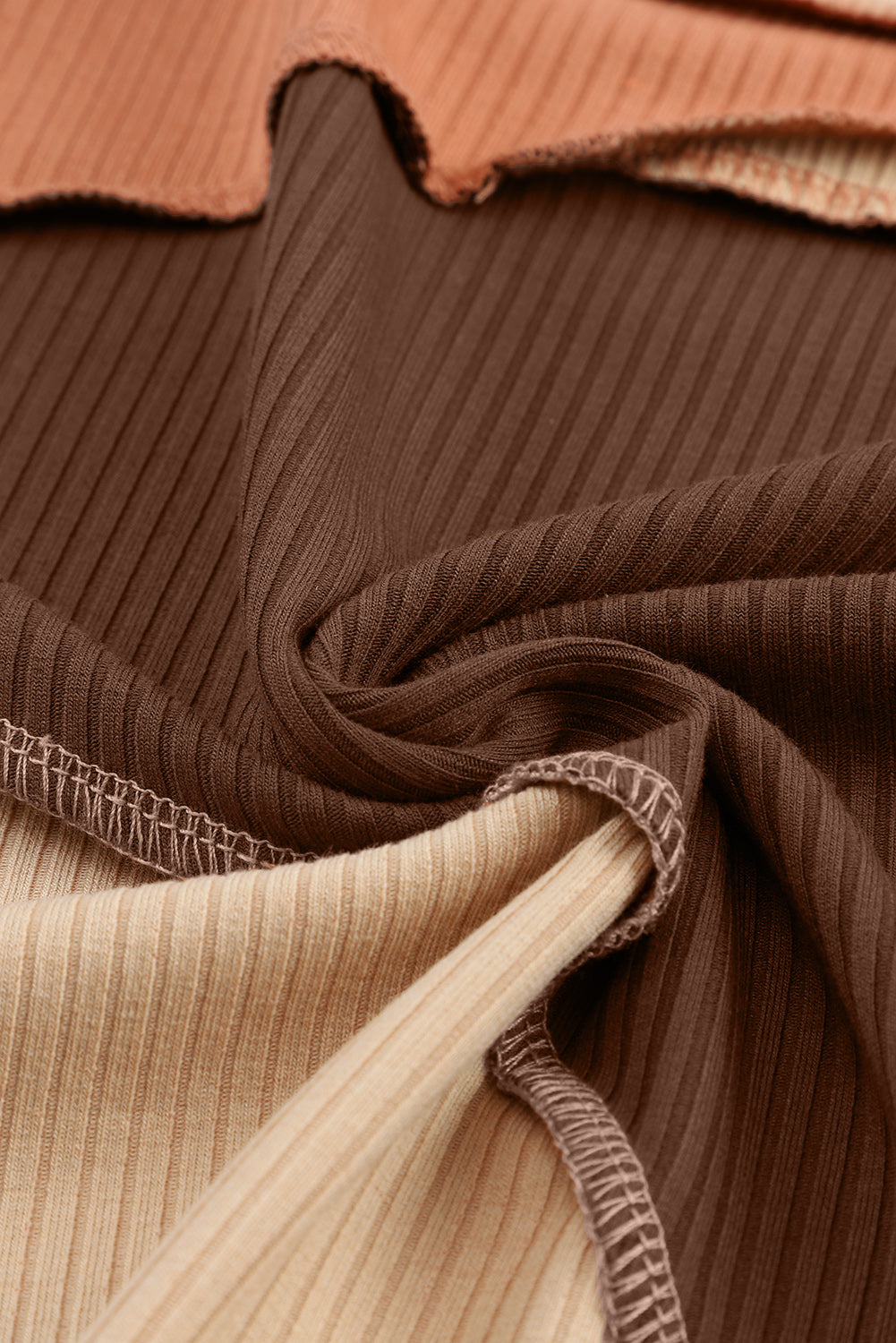 Knit Top with Exposed Seam Detail in Brown Color Block