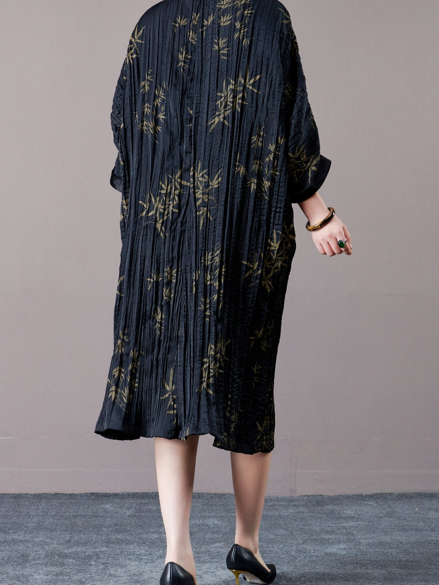 Elegant Black Pleated Maxi Dress with Golden Bamboo Motif
