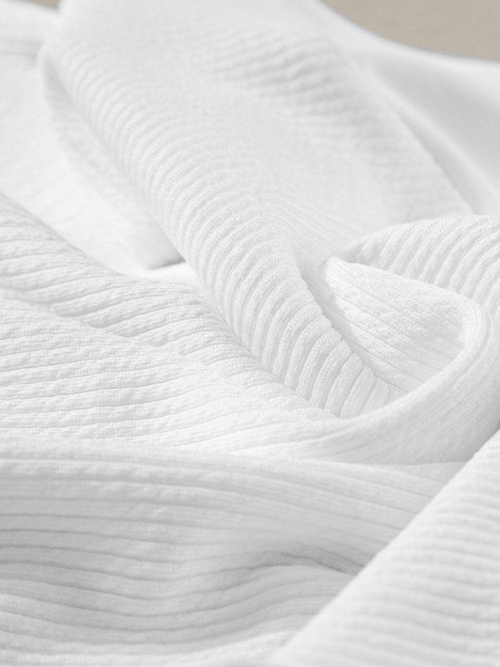 Sleek White Ribbed Zip-Up Mock Neck Bodysuit