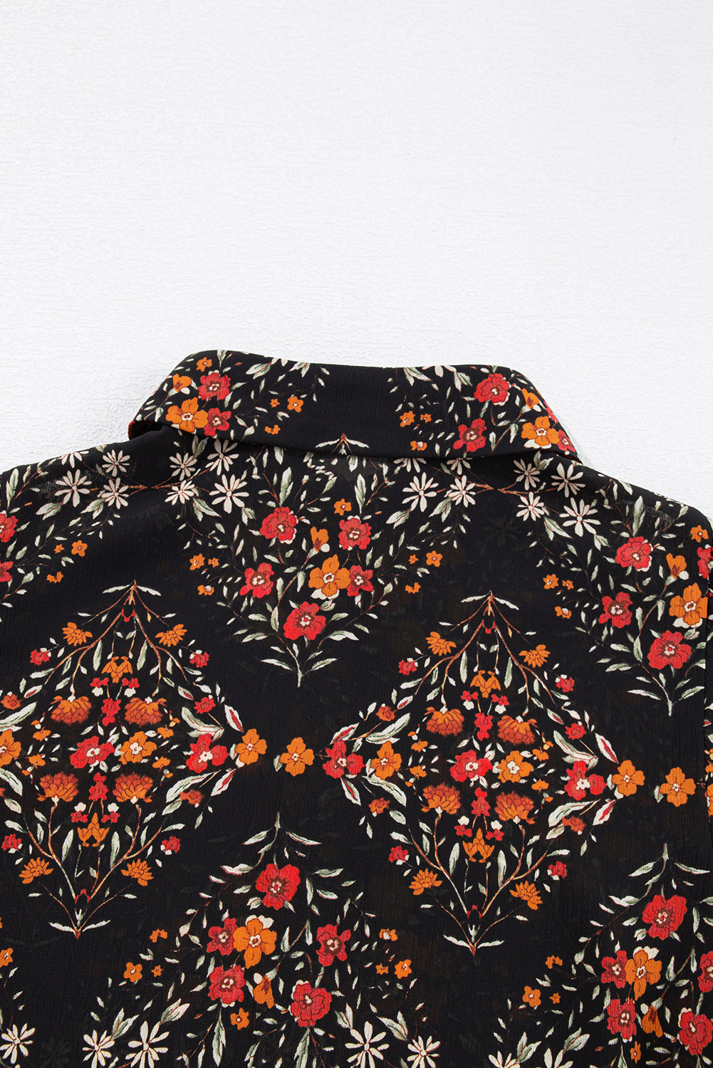 black floral shirt