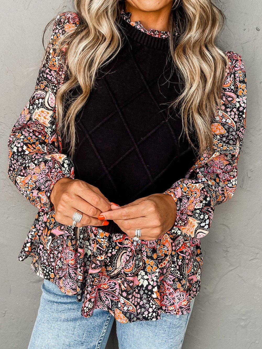 Graceful Black Floral Peplum Sweater with Ruffled Hem