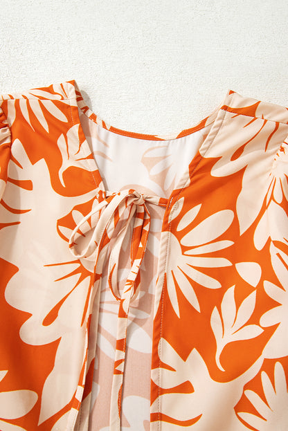 orange floral blouse
