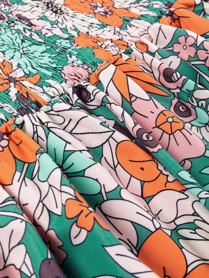 Floral Fantasy Smocked Puff Sleeve Peplum Top