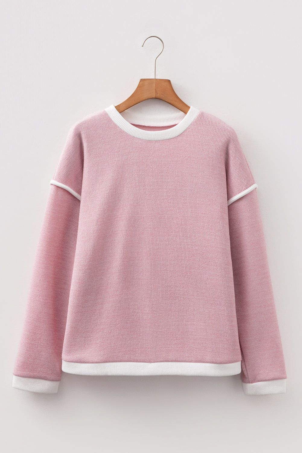 light pink knit top