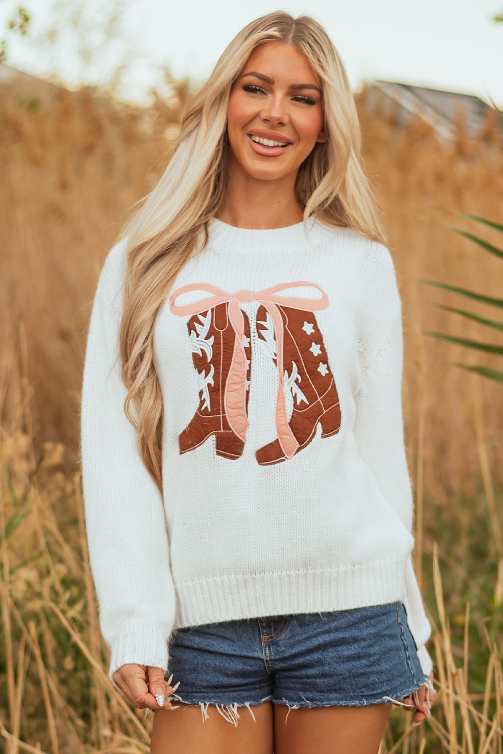 white embroidered sweater