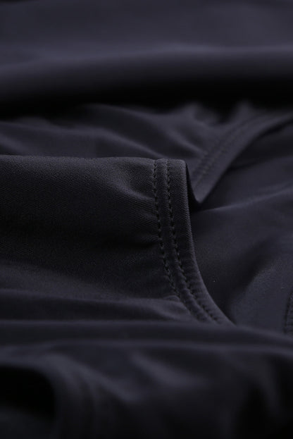 Floral Print Black Swimdress with Adjustable Straps and Ruched Panel