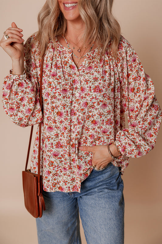 red floral blouse