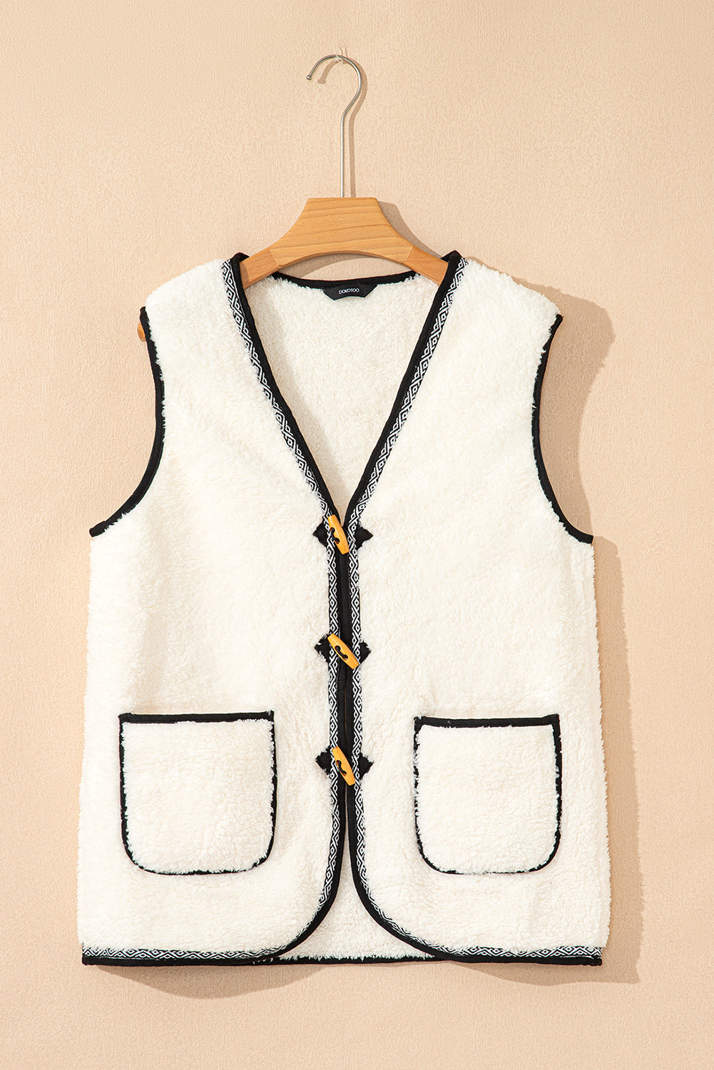 white sherpa vest