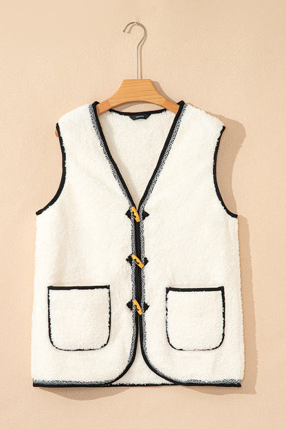 white sherpa vest
