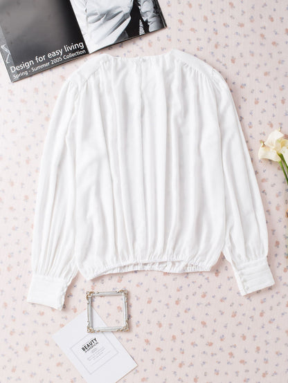 Elegant White Pleated Blouse with Puff Sleeves