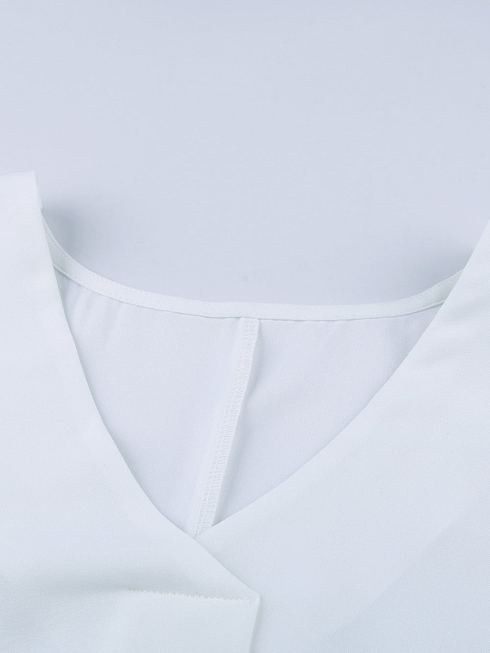 Elegant White V Neck High Low Hem Blouse