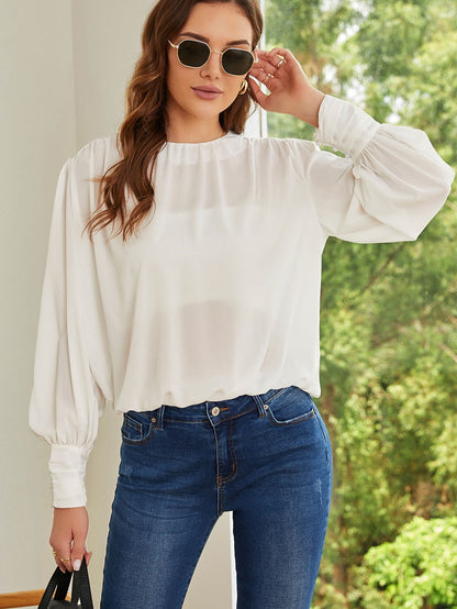 Elegant White Pleated Blouse with Puff Sleeves