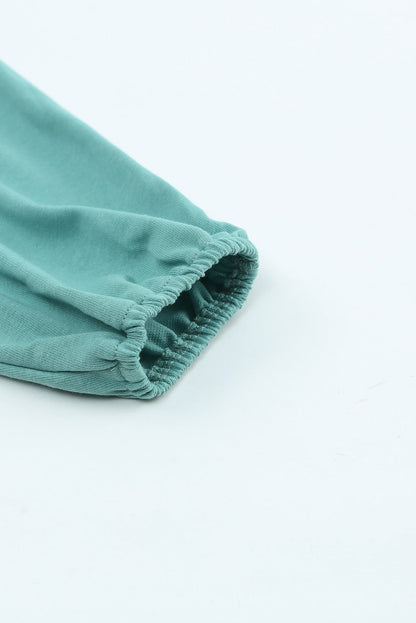 Emerald Green Flowy V Neck Blouse