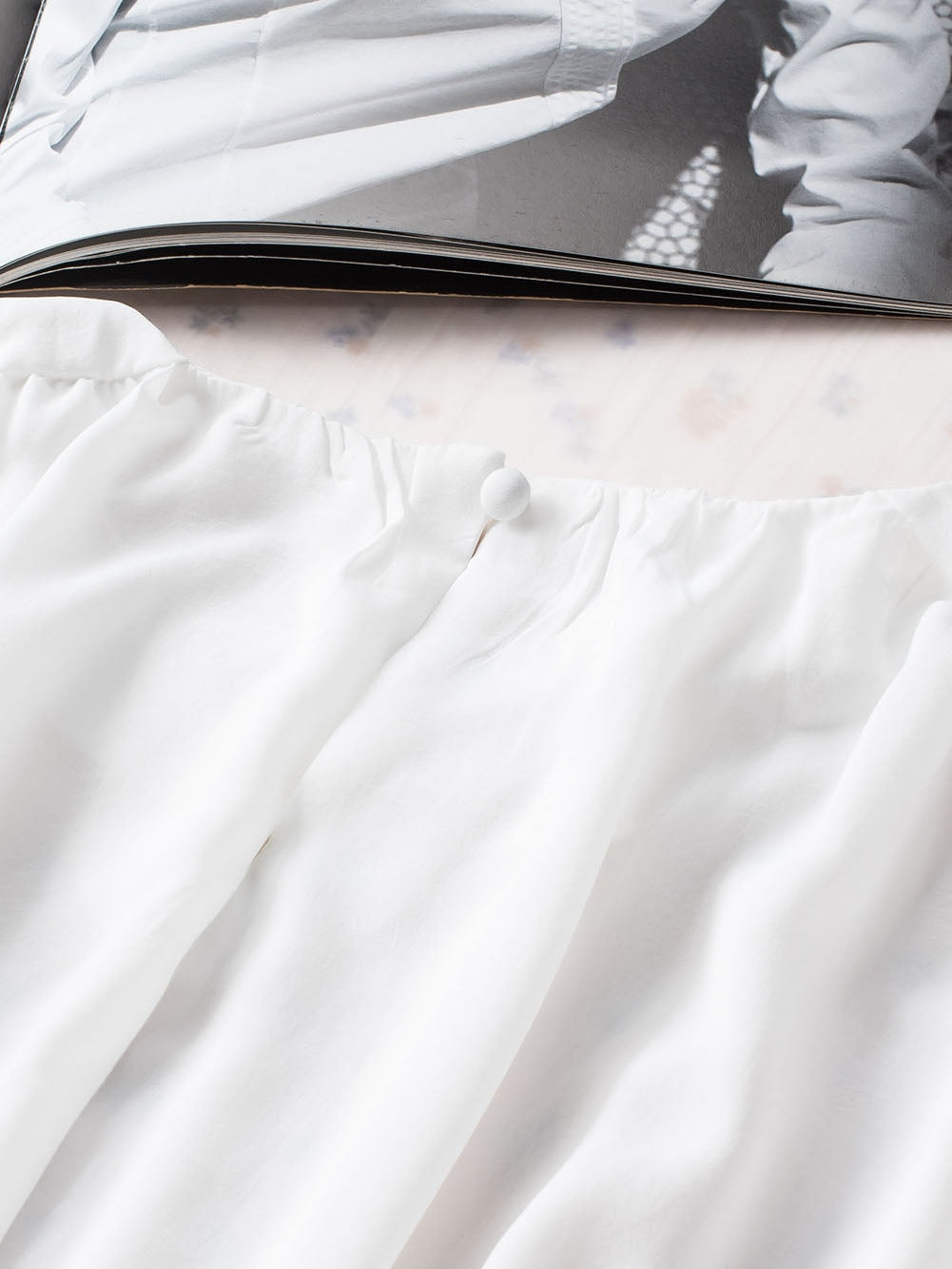 Elegant White Pleated Blouse with Puff Sleeves