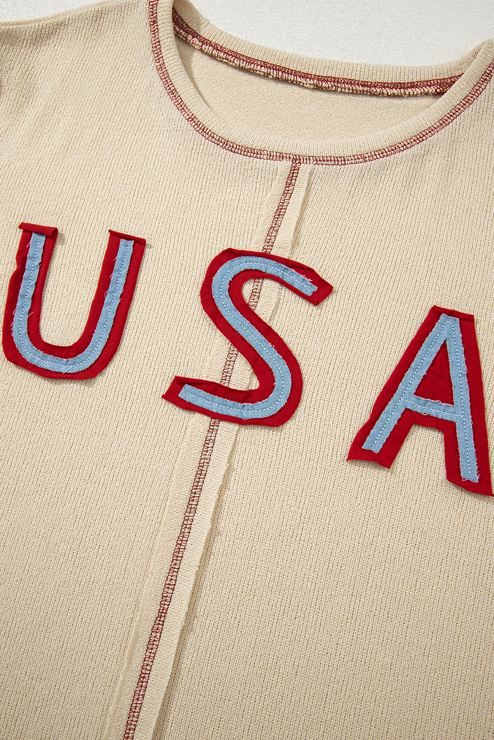 exposed seam long sleeve top