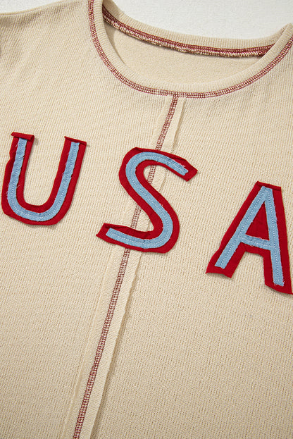 exposed seam long sleeve top