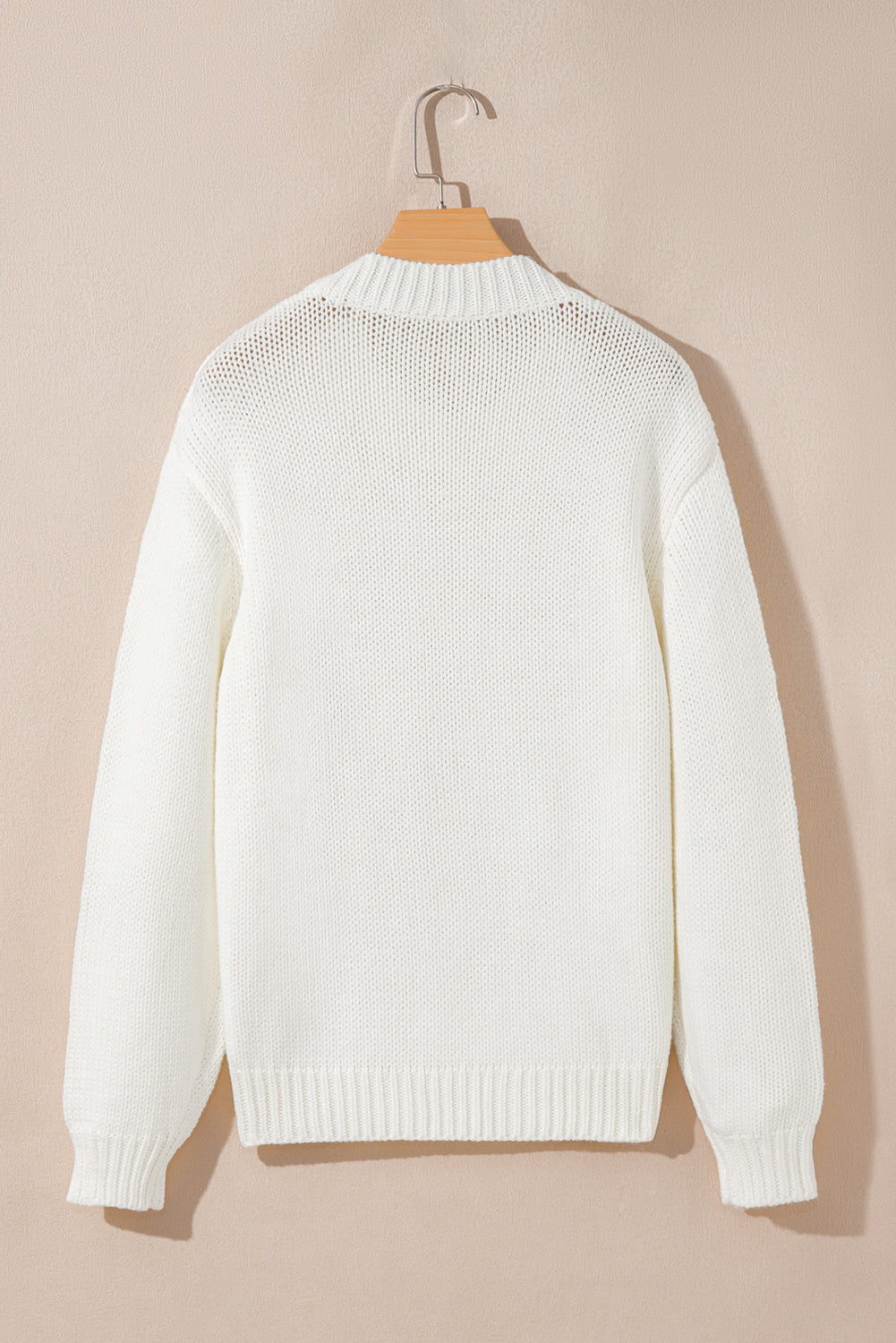 white embroidered sweater