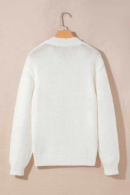 white embroidered sweater