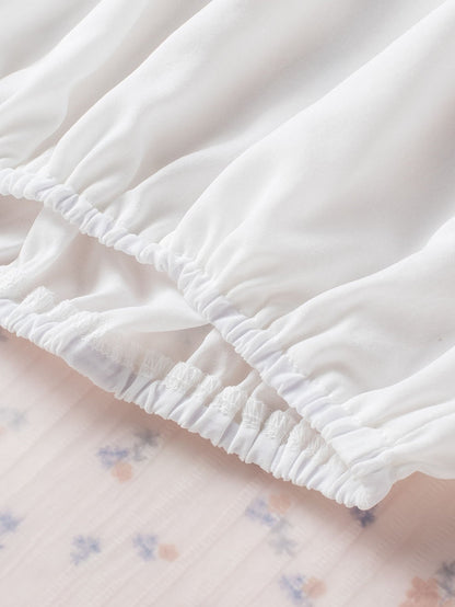 Elegant White Pleated Blouse with Puff Sleeves