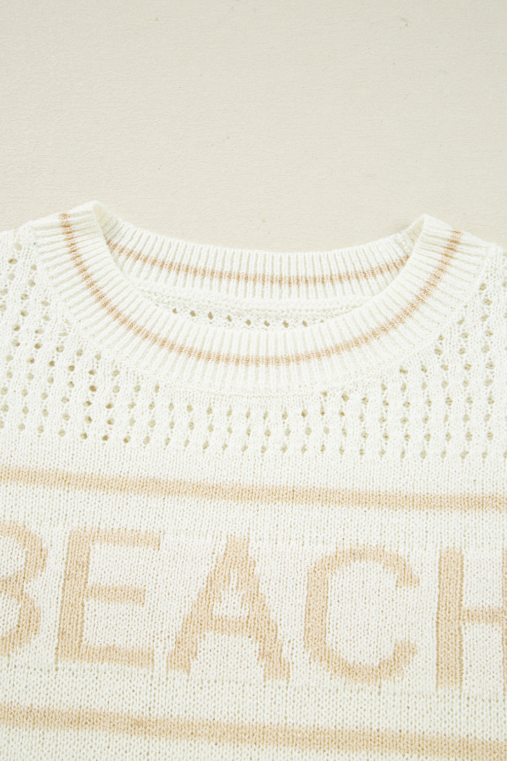 white beach sweater