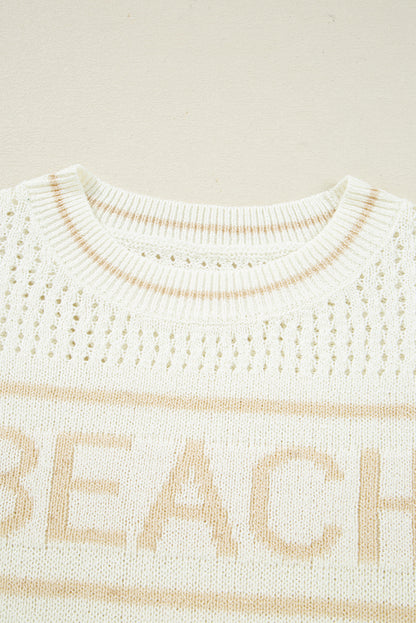 white beach sweater