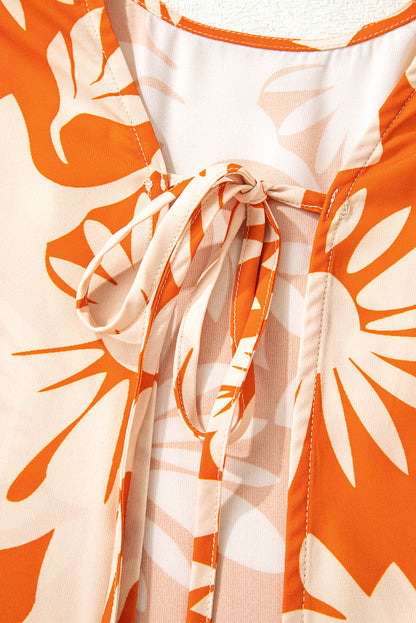 orange floral blouse