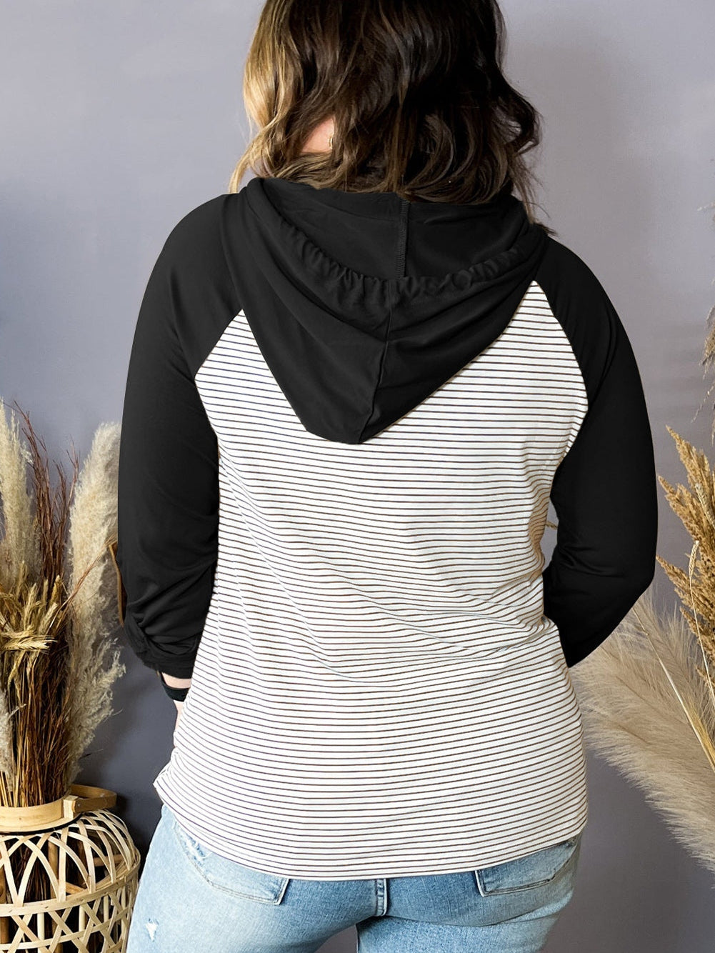 Cozy Black Striped Raglan Hoodie with Buttoned Pocket for Curvy Fashionistas