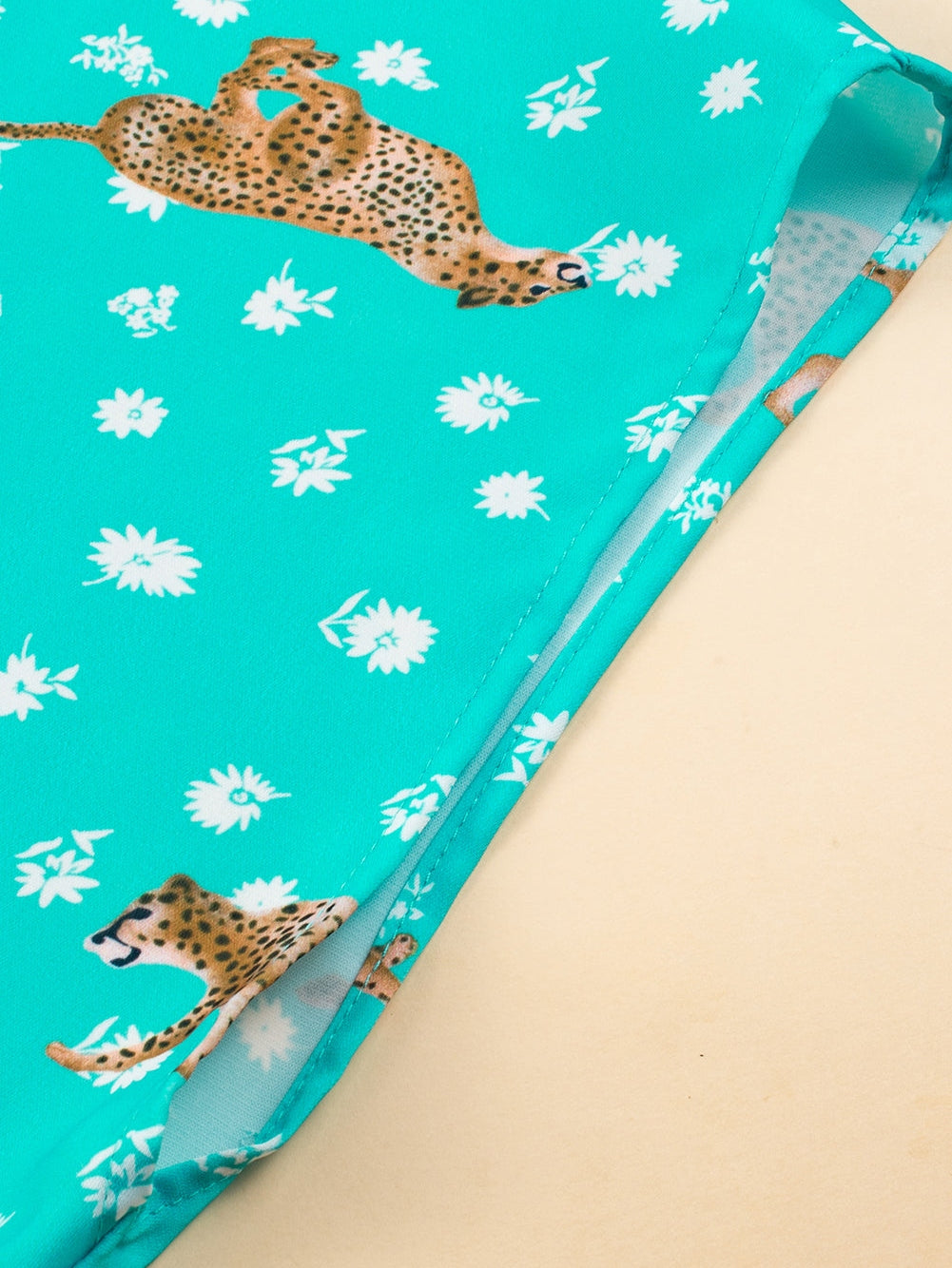 Green Cheetah Print V Neck Short Sleeve Plus Top