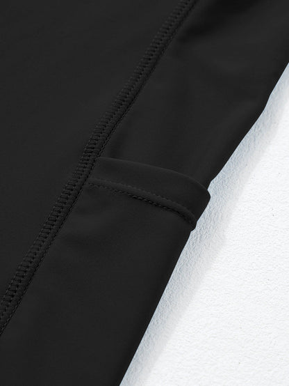 Sporty Black Ribbed Spaghetti Straps Swimdress with Flared Silhouette