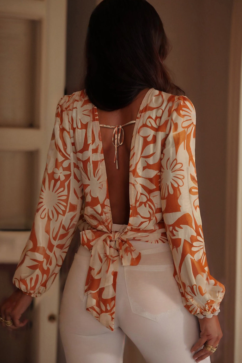 orange floral blouse