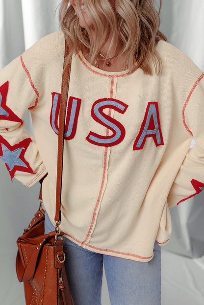 exposed seam long sleeve top