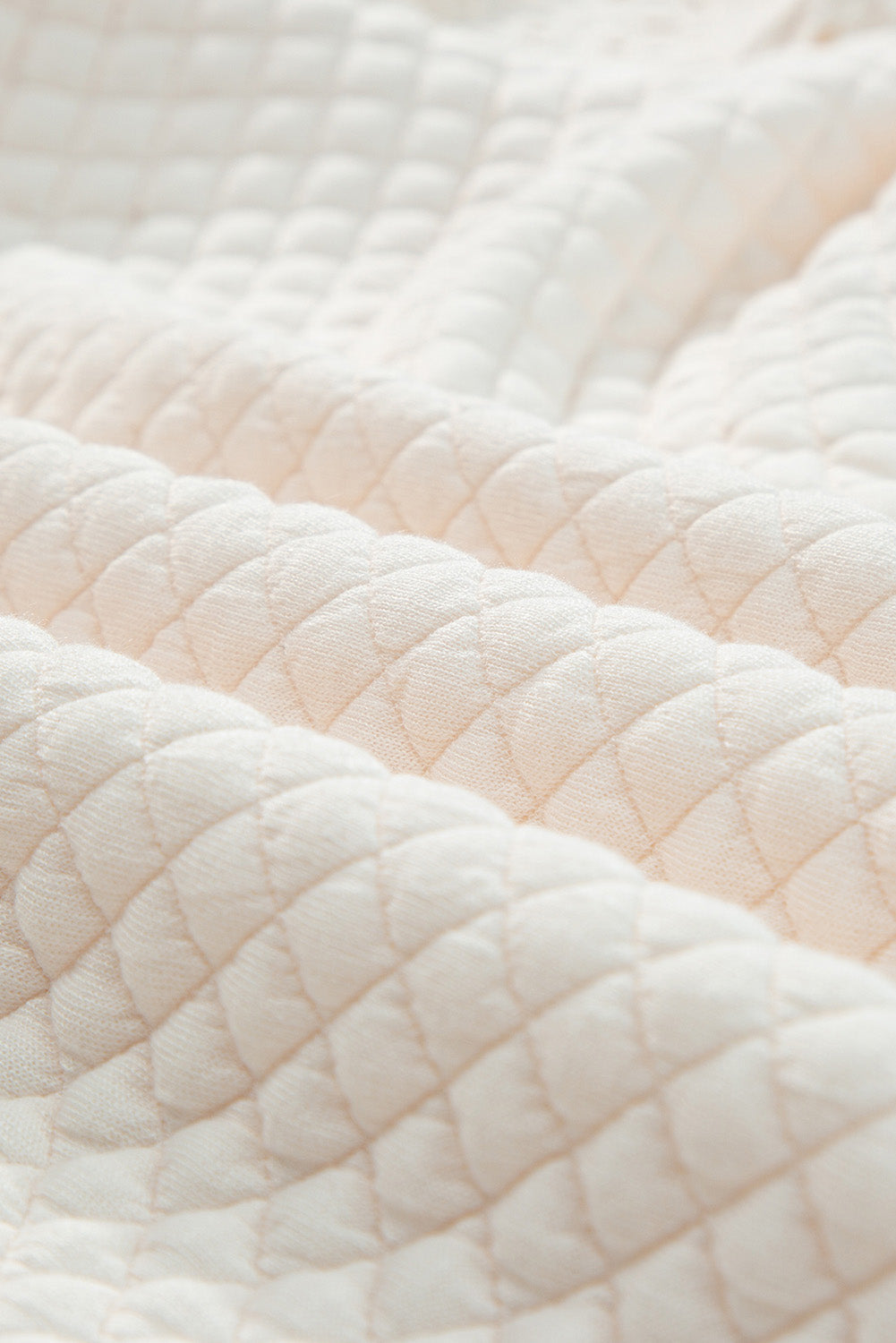 Eyelet Accent Quilted Patchwork Sleeve Blouse