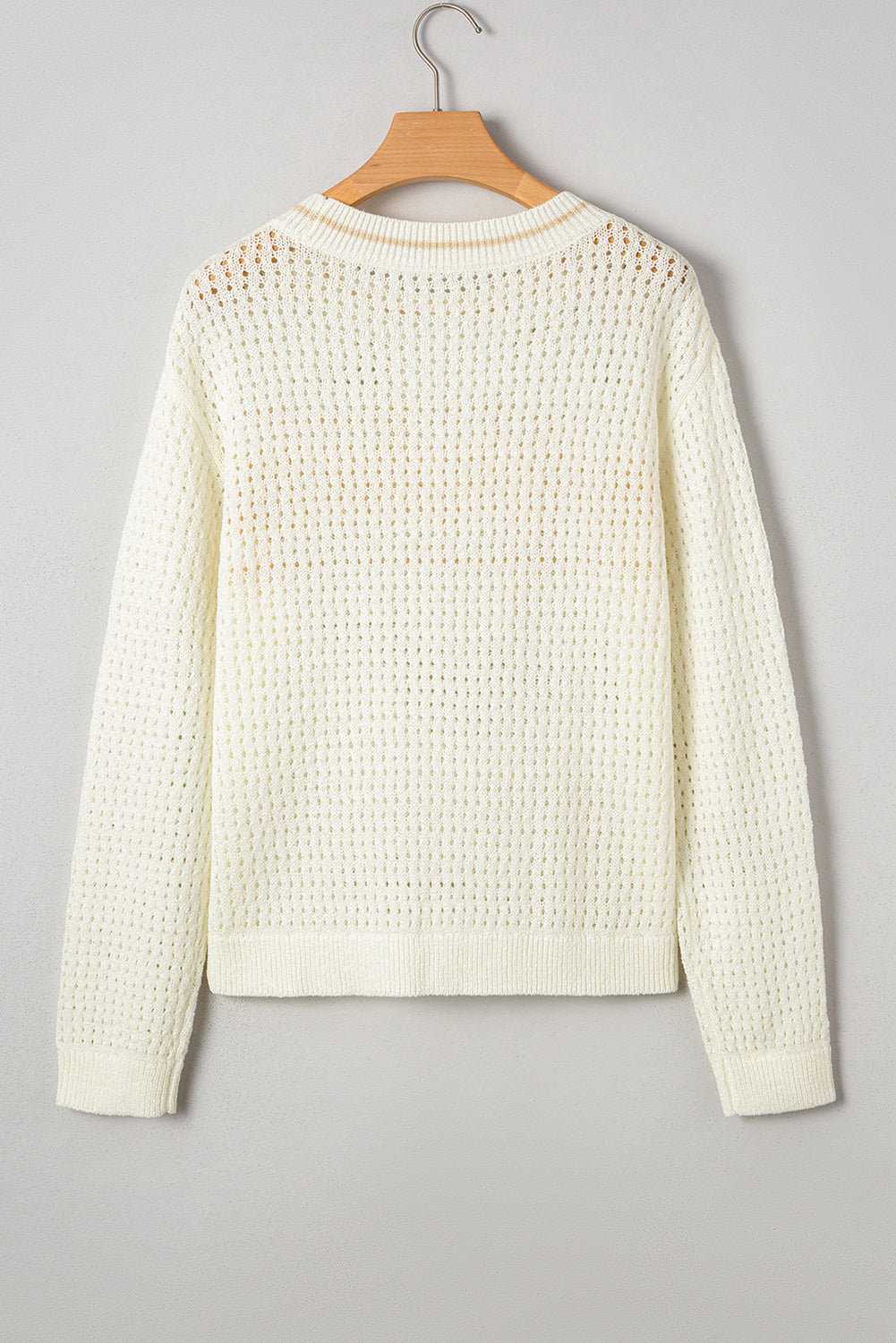 white beach sweater