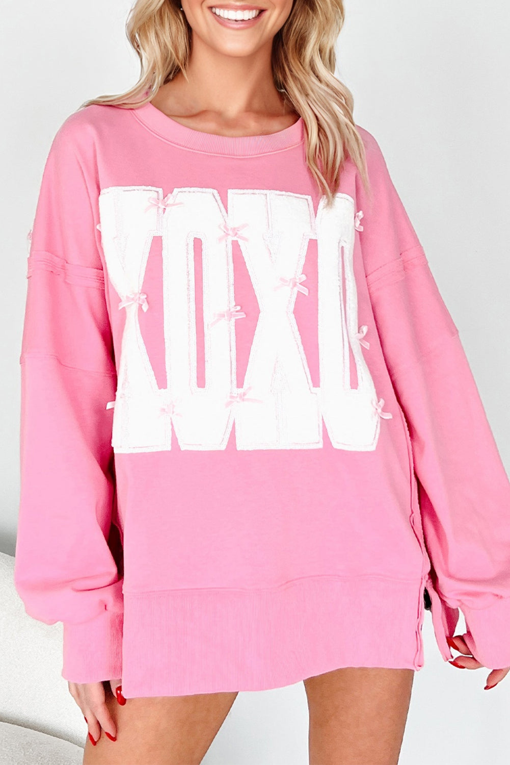 Pink Bow Sequin XOXO Letter Graphic Exposed Seam Baggy Sweatshirt