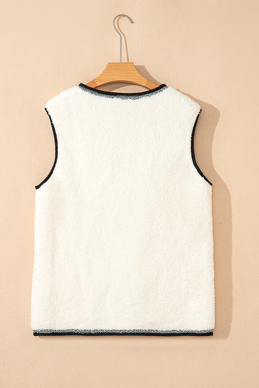 white sherpa vest