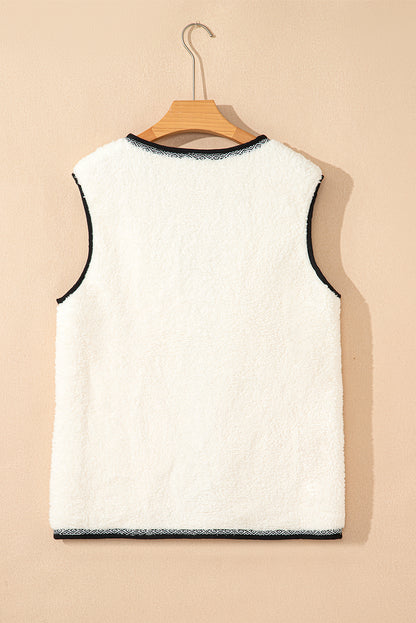 white sherpa vest