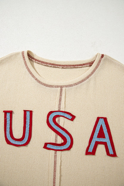 exposed seam long sleeve top