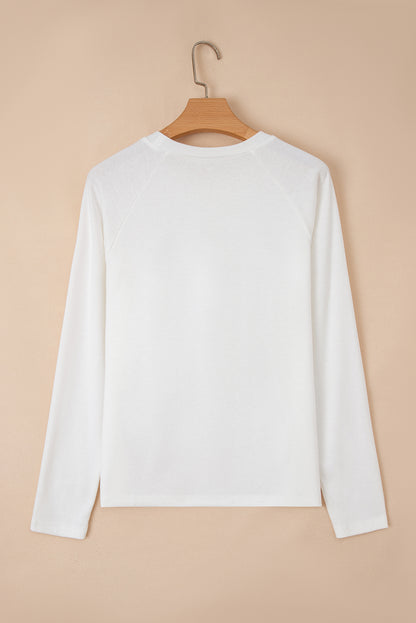 white long sleeve top