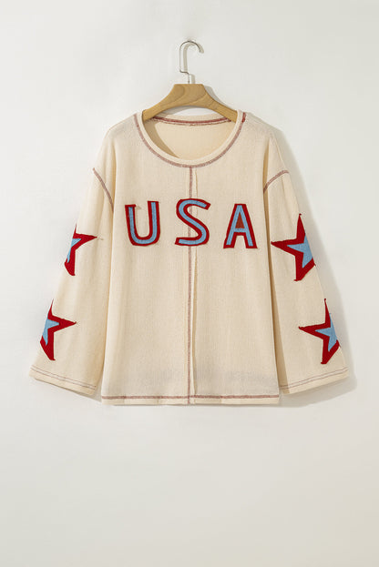exposed seam long sleeve top