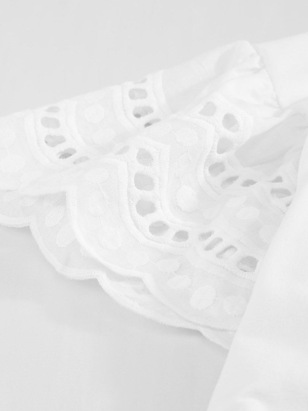 Elegant White Ruffle Sleeve Tee with Cut-Out Design