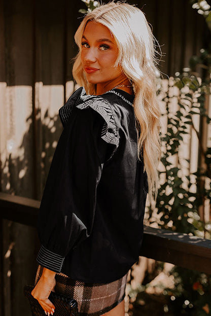 black long sleeve top