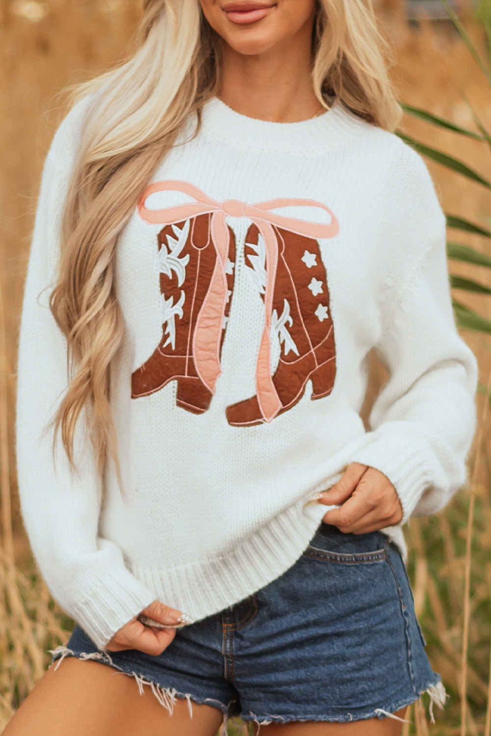 white embroidered sweater