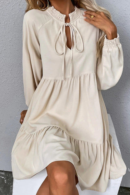 Beige Tie Split Neck Smocked Detail Long Puff Sleeve Ruffle Hem Loose Dress